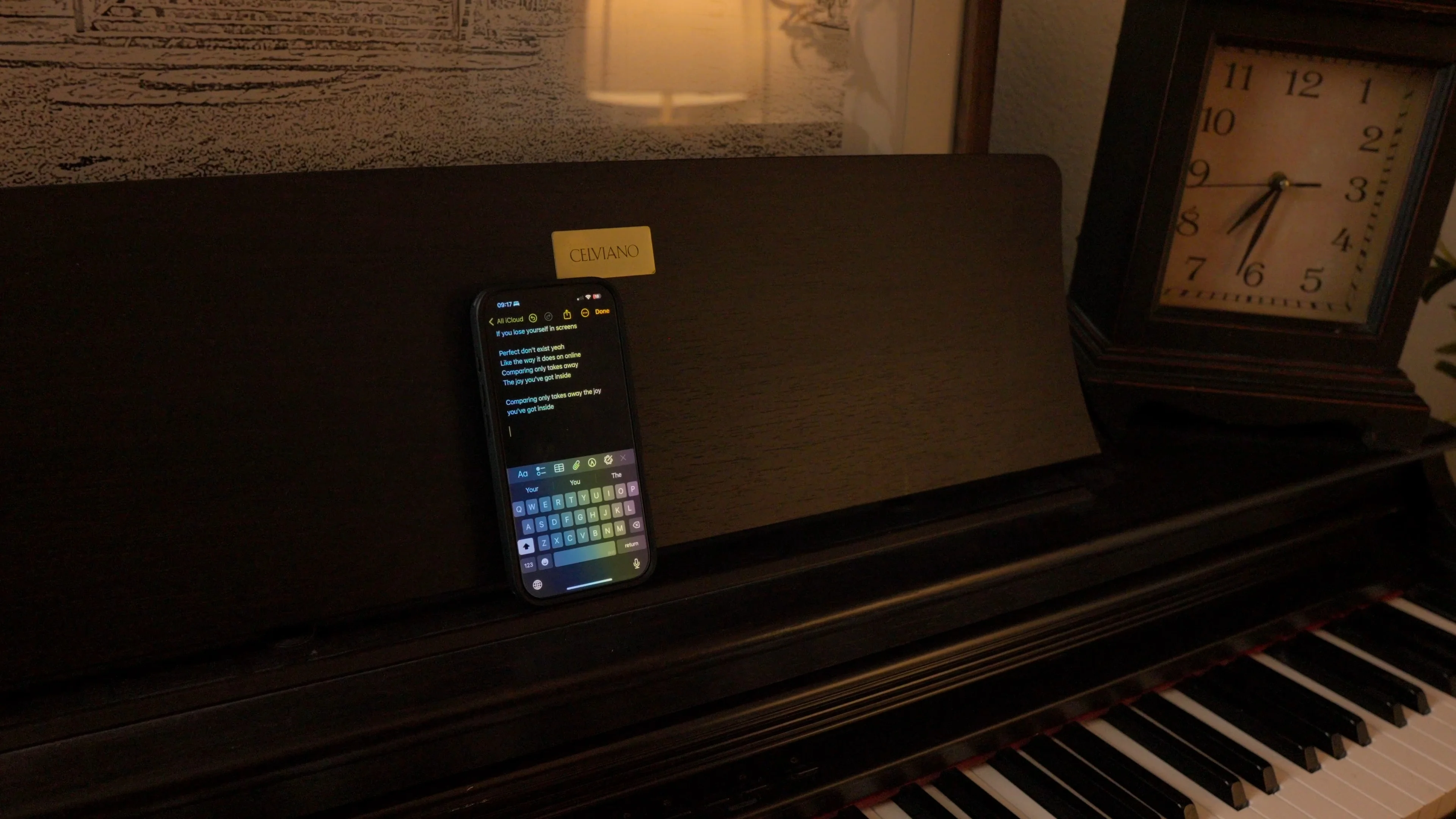 Studio setup with piano and monitoring tools, reflecting a professional workflow environment for mastering