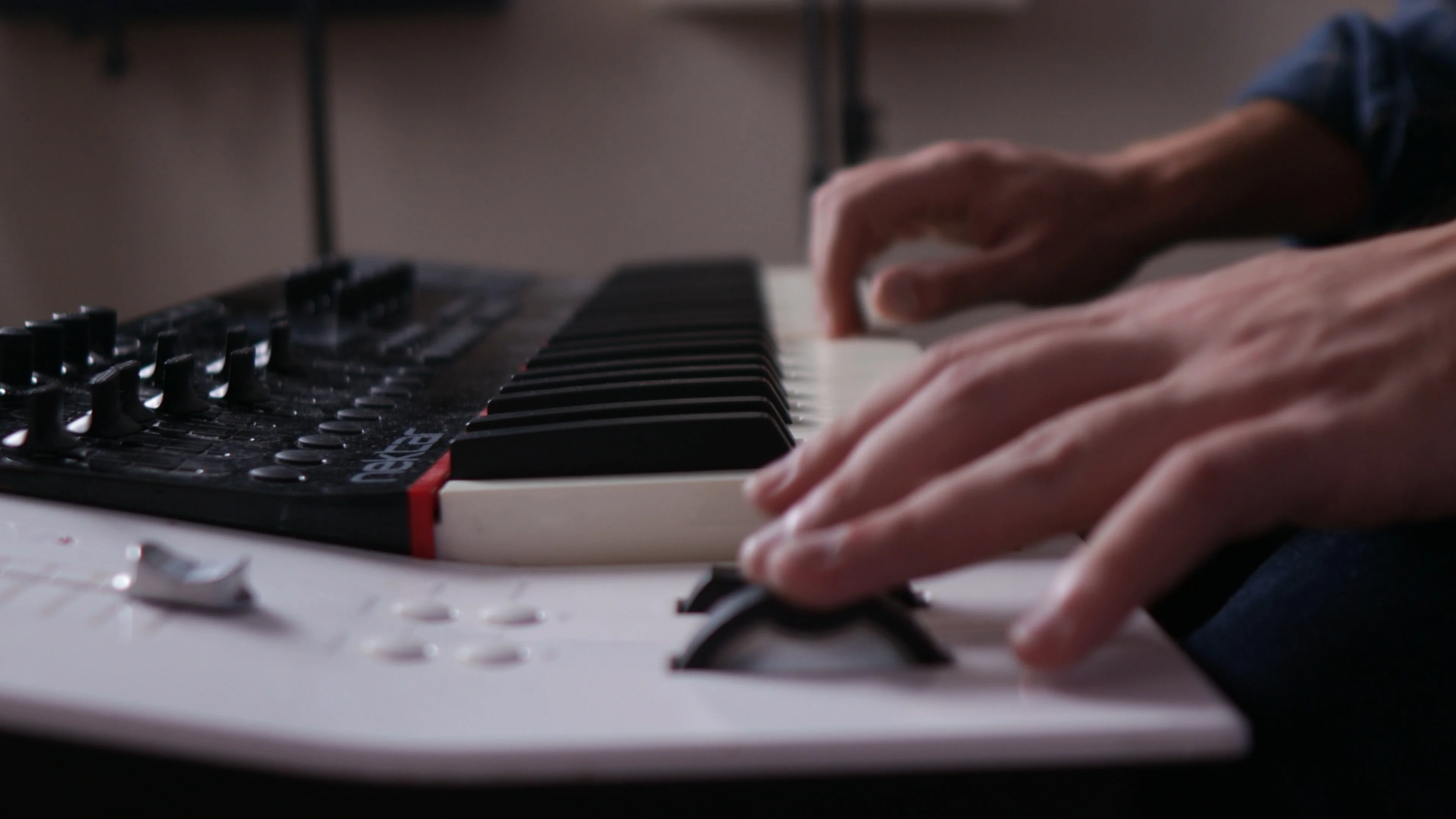 Mattie working in home studio applying vocal EQ techniques during a mixing session