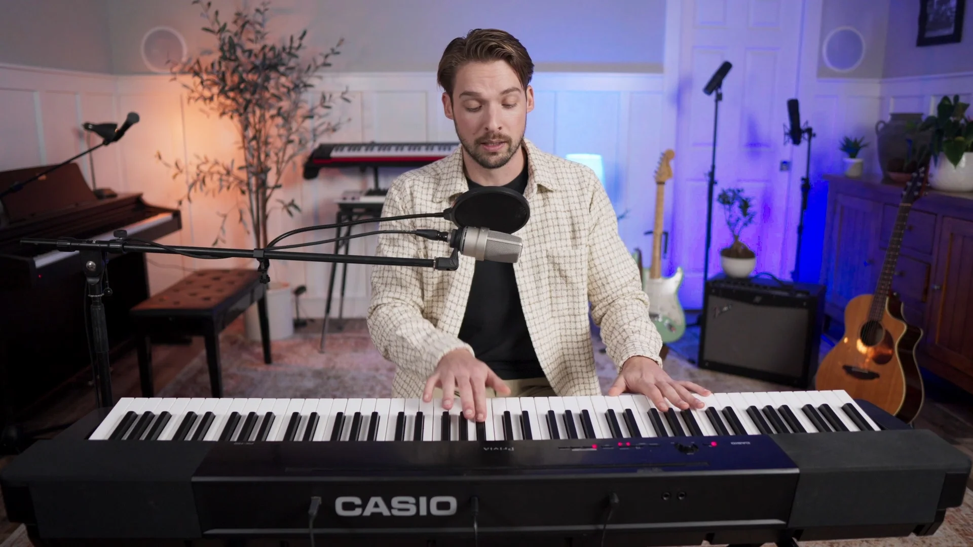 Mattie playing keyboard by ear to identify the key of a beat